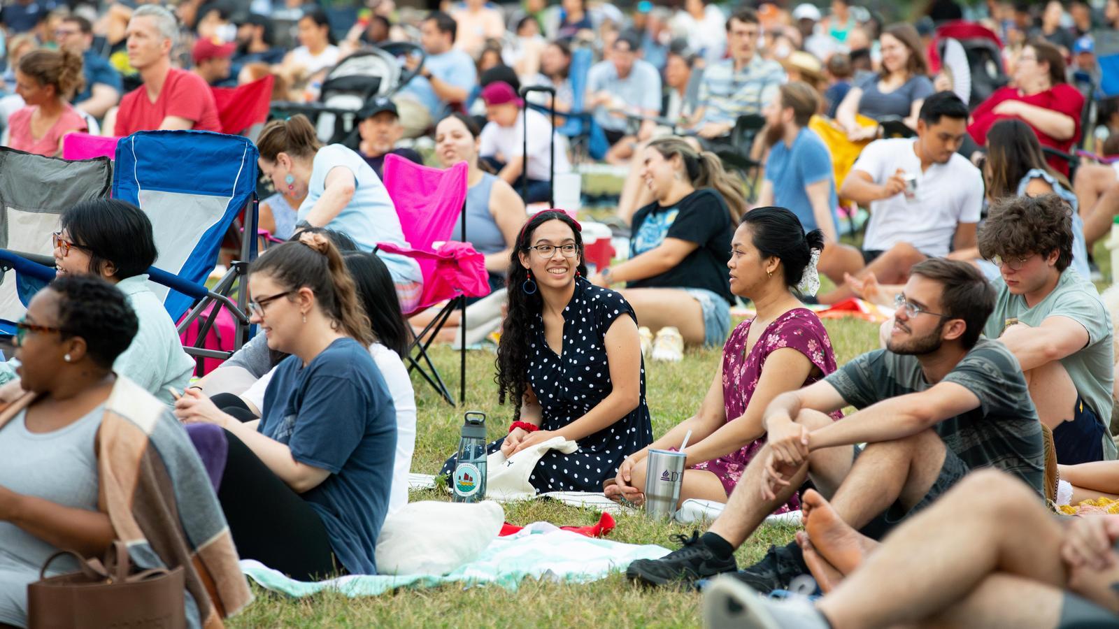 neighbors enjoying the DSO parks concert series at Exall Park